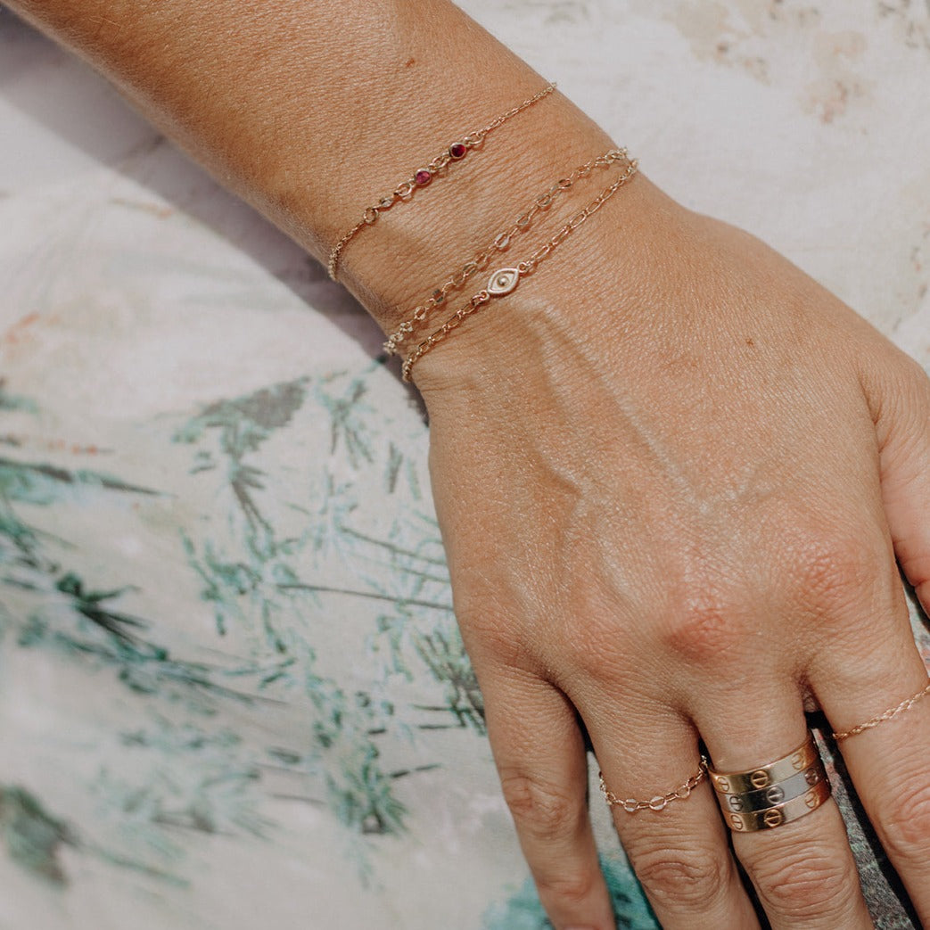 14k permanent bracelet with evil eye