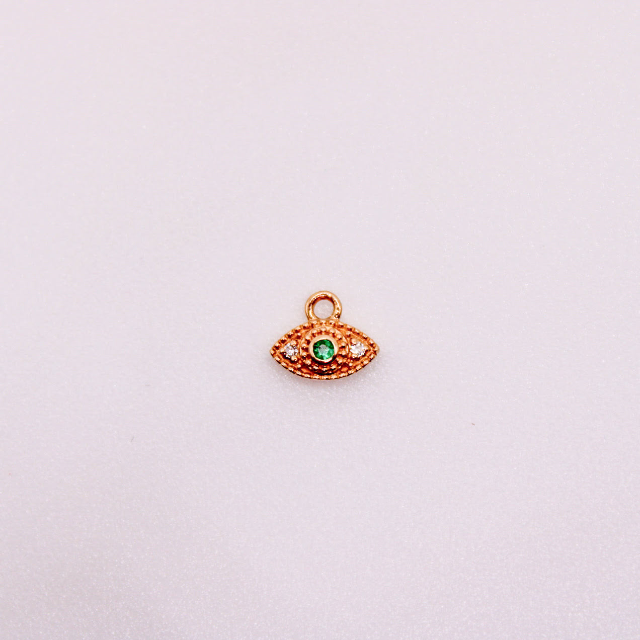14k gold diamond and emerald evil eye charm for permanent jewelry